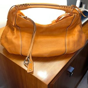Abro pebbled leather orange hobo bag